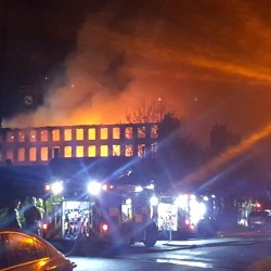 Picture Of Huge fire breaks out at derelict mill in Huddersfield